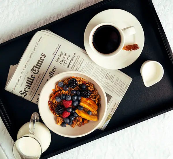 An image highlighting breakfast in bed.