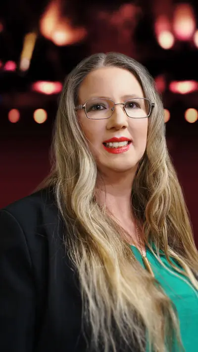 Ena H. QCC casino host
